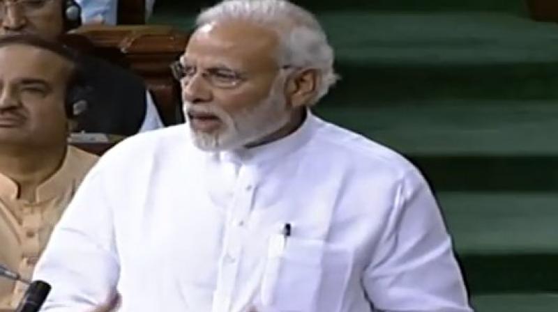 Congress President Rahul Gandhi and Prime Minister Narendra Modi after his speech in the Lok Sabha on no-confidence motion during the Monsoon Session of Parliament, in New Delhi. (LSTV GRAB)
