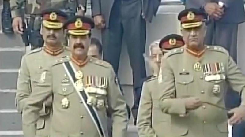 Outgoing Pak army chief Gen Raheel handed over the command of worlds sixth-largest army by troop numbers to 57-year-old Bajwa at a ceremony held in the Army Hockey Stadium in Rawalpindi. (Photo: Twitter/ANI)