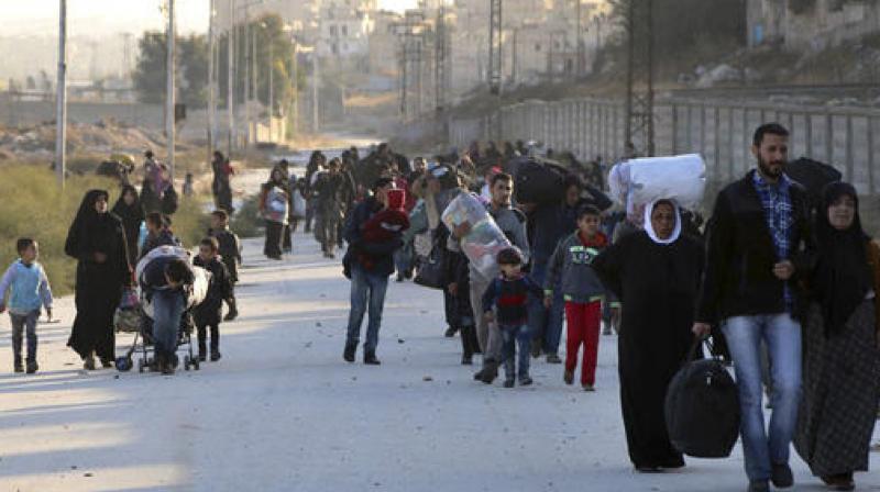 The regime gains have prompted an exodus of thousands of desperate civilians, some fleeing to districts held by the government or Kurdish forces. (Photo: AP)