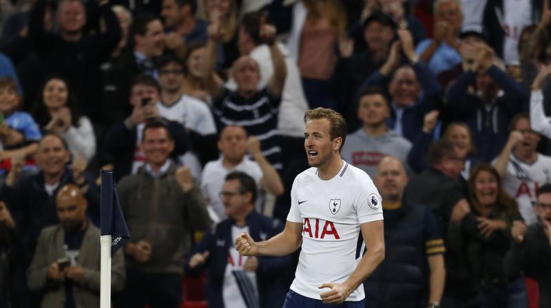 Harry Kane celerates after scoring  the important goal against Newcastle United. (Photo: AFP))