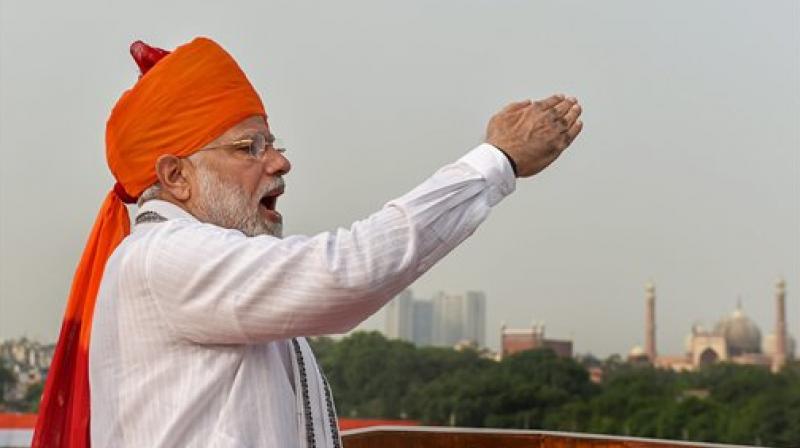 In his last Independence Day speech before Lok Sabha elections, PM Modi presented a picture of rising India under his government, contrasting it with what he termed was policy paralysis under the UPA. (Photo: PTI)