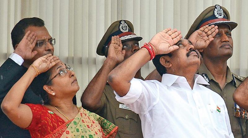 Chief Minister Edappadi K. Palaniswami and chief secretary Girija Vaidyanathan salute the national flag during the 72nd Independence Day celebrations, at Fort St. George in Chennai on Wednesday.    (Image: DC)