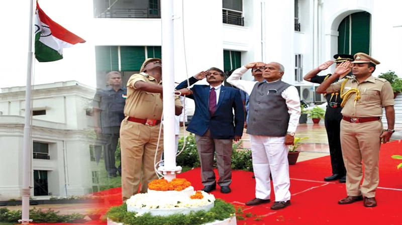 Governor Banwarilal Purohit hoists the national flag for the first time in Raj Bhavan during the Independence Day celebrations, on Wednesday. 	(Image: DC)