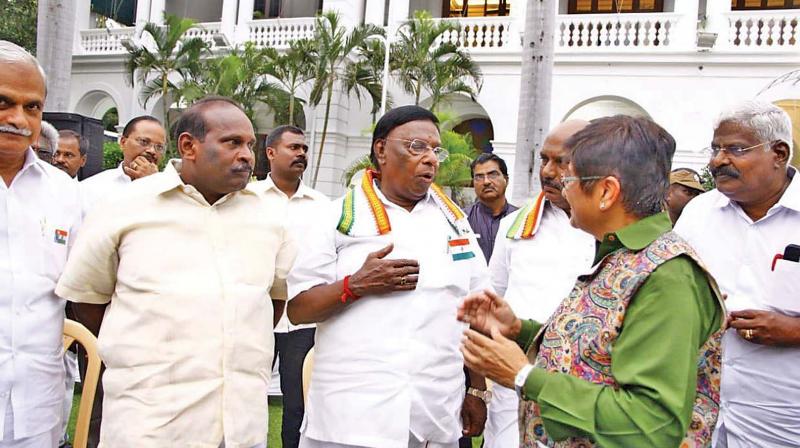 Chief Minister V Narayanasamy greets Lt Governor Kiran Bedi at the Independence Day celebrations in Indira Gandhi Sports Complex at Uppalam.   (Image: DC)