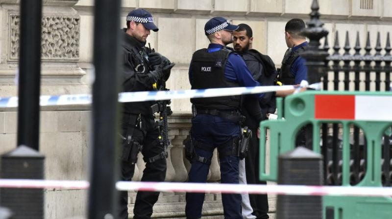 Witnesses reported seeing armed police blocking off Whitehall (Photo: AP)