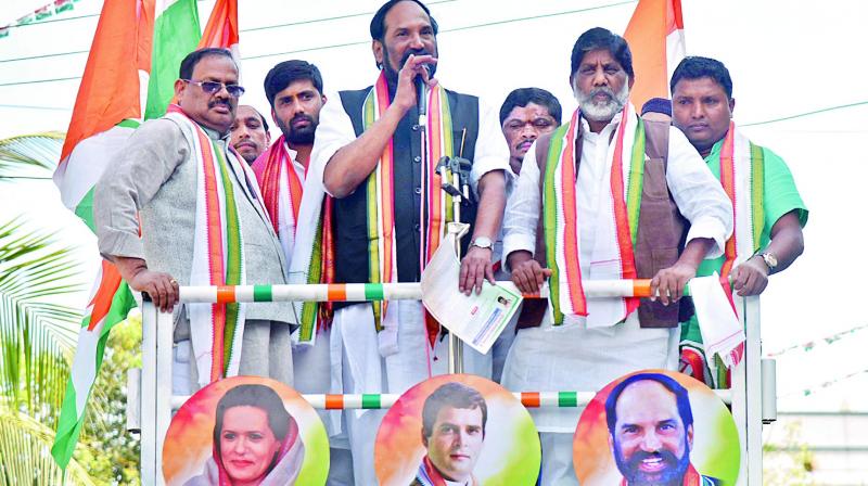 TPCC chief  N. Uttam Kumar Reddy adresses a gathering while Telangana Congress in-charge R.C. Khuntia and other leaders look on as they take out a Nirudyoga Chaitanya Yatra in Hyderabad on Tuesday.	 (Photo: DC)