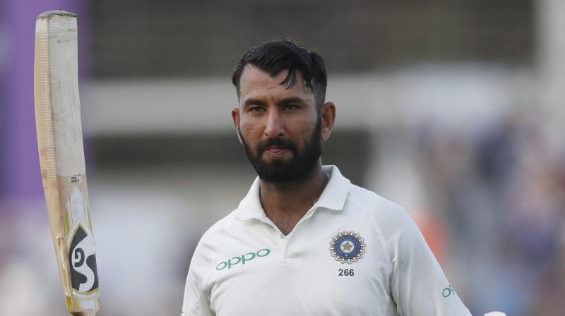 Cheteshwar Pujaras painstaking and brave century (132 not out) gave India a narrow lead on the second day of the fourth Test against England in Southampton. (Photo: AP)