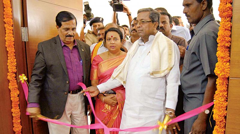 Chief Minister Siddaramaiah inaugurates Centenary Building at Kannada Sahithya Parishat in Bengaluru on Monday. (Photo: KPN)