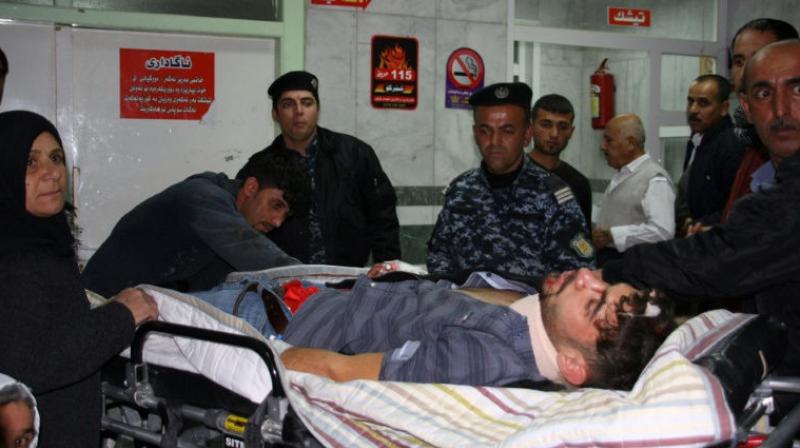 An earthquake victim is aided at Sulaimaniyah Hospital in Iraq. (Photo: AFP)