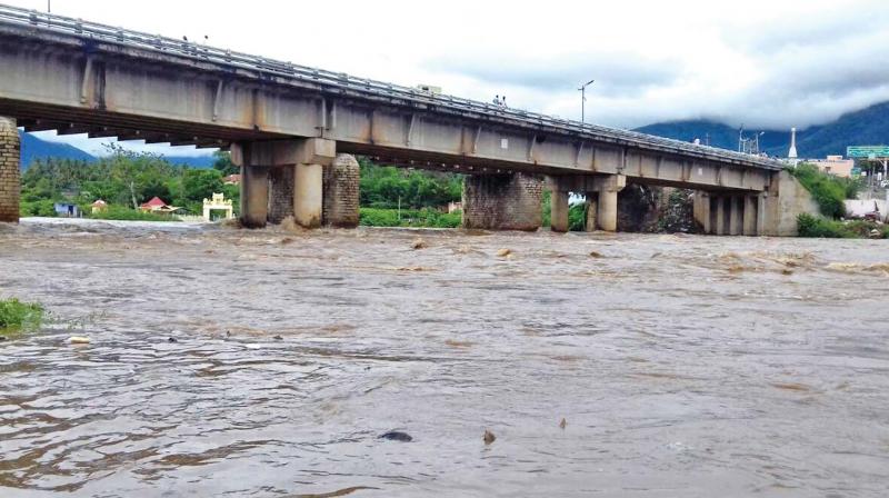 Due to heavy rains, water flow in the Bhavani river crossed the danger mark on Sunday. (Photo: DC)