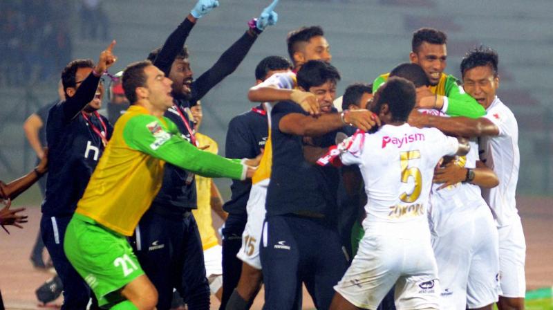 Players of Northeast United FC celebrating after scoring a goal against FC Pune City in the ISL match, at Indira Gandhi Athletics Stadium in Guwahati on Tuesday (Photo: AP)