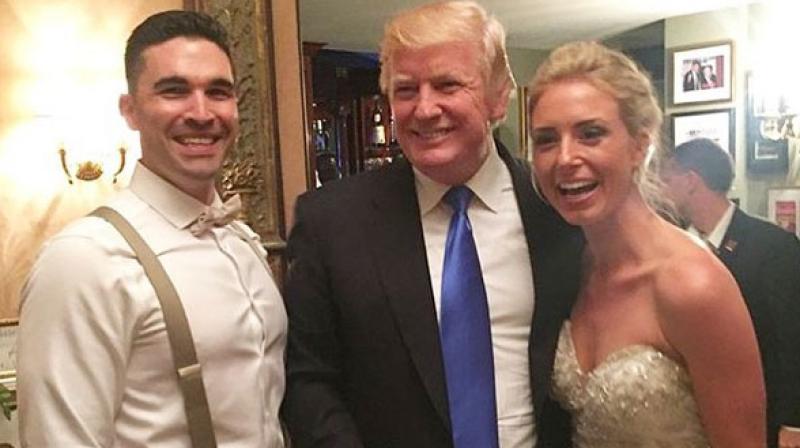 US President Donald Trump with bride Kristen Piatkowski and groom Tucker Gladhill (Photo: trumpadmin.daily.updates)