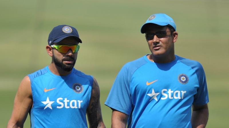 While a rumoured rift between Indian captain Virat Kohli and chief coach Anil Kumble has been gaining ground since the past few days, the Australian teams payment dispute with their cricket board is out in the public domain.(Photo: AFP)