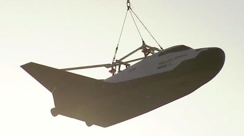The Dream Chaser was lifted to an altitude at which it would be released for a free flight that is scheduled to happen later this year.