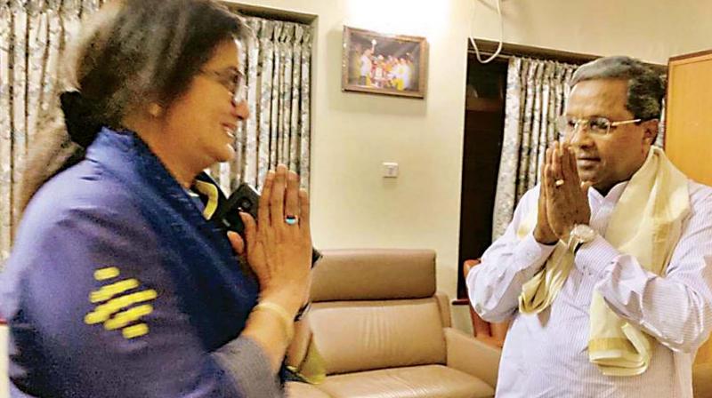 A recent file photo of actress Sumalatha Ambareesh meeting former chief minister Siddaramaiah