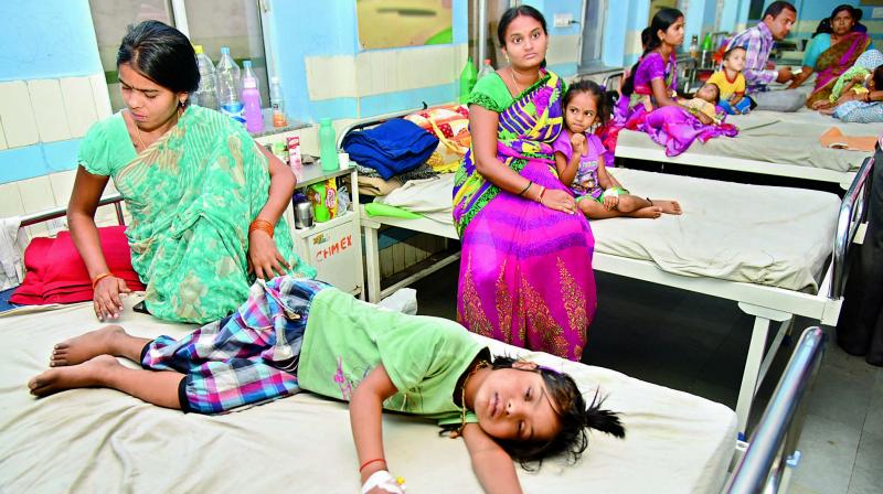 Children lying in a ward in Gandhi Hospital after suffering from chills and fever. (Photo: DC)