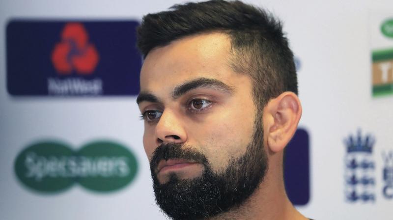 Photographs of Indian players including Virat Kohli, Suresh Raina, Rohit Sharma and L. Balaji have appeared with ICCs most wanted man Aneel Munawar in the latest documentary released by the Doha-based Al Jazeera. (Photo: AP)