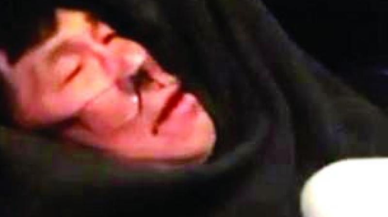 This screen grab of the video that went viral shows a bleeding Dr David Dao, after he was dragged out of the United jet.
