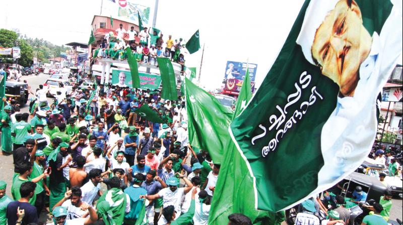 IUML workers cheer at a victory rally held in Malappuram after party leader P.K. Kunhalikkutty was declared elected in the Lok Sabha bypolls on Monday. (Photo: DC)