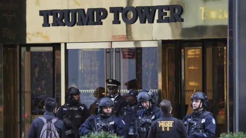 In this file photo, security personnel stand at the front entrance of Trump Tower in New York. The laptop stolen from a Secret Service agent on Friday reportedly contained details of floor plans of Trump Tower. (Photo: AP)