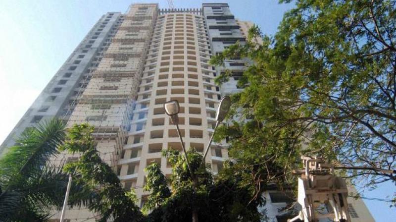 The apartments in a tiny part of town in Mumbai were meant for the families of Kargil heroes.  In picture: Adarsh Housing Society in Mumbai. (Credit: PTI)