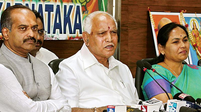 BJP state chief B.S. Yeddyurappa and MP Shobha Karandlaje during a press conference at BJP office, in Bengaluru on Wednesday. (Photo: DC)