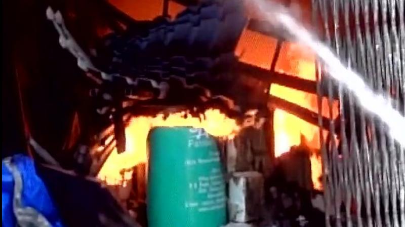 The blaze erupted Saturday afternoon inside the premises of Indian Corporation industrial area. (Photo: ANI/Twitter)