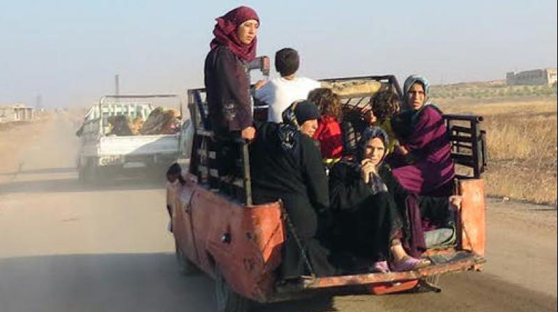 Civilians fleeing their hometowns in Hama, Syria (Photo: AP)
