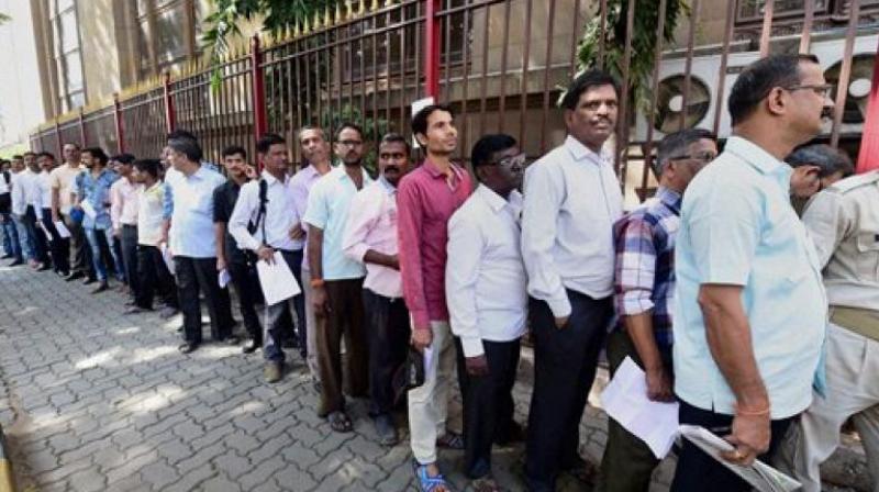 For the last three days, the bank counters and ATMs in many parts of the districts were witnessing long queues. Representational image