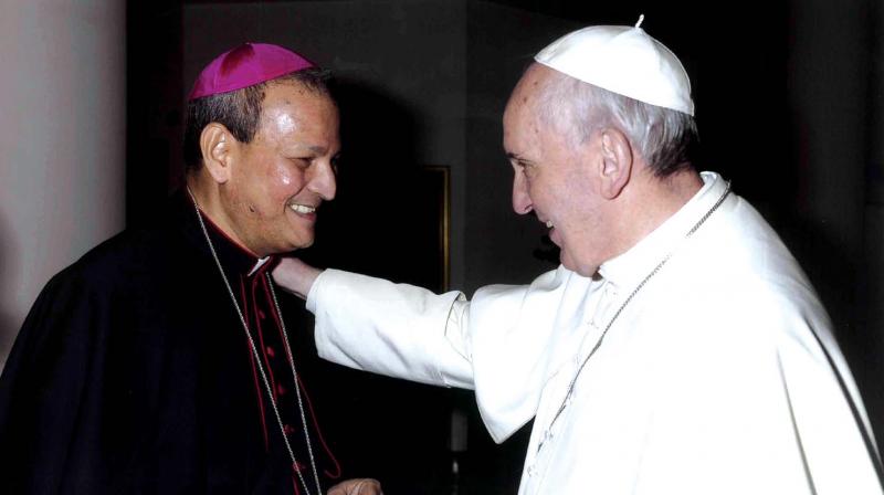 Archbishop Dr. Joseph (Joy) Kalathiparambil wtih Pope Francis