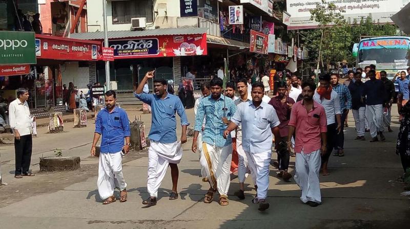 Yuva Morcha activists take out a protest demanding the resignation of Raveendranath in Balussery on Thursday.  (Photo: DC)
