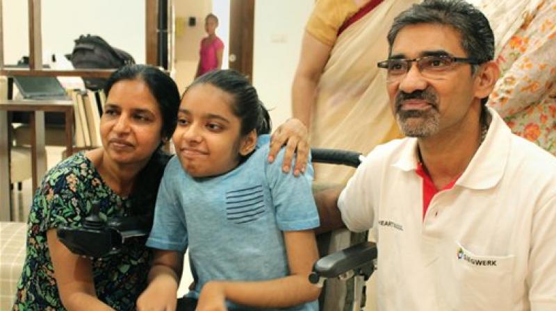 Parents and teachers of Anushka Panda celebrate after she was declared All India Topper in differently abled category by CBSE in Class 10 examination, in Gurgaon. (Photo: PTI)