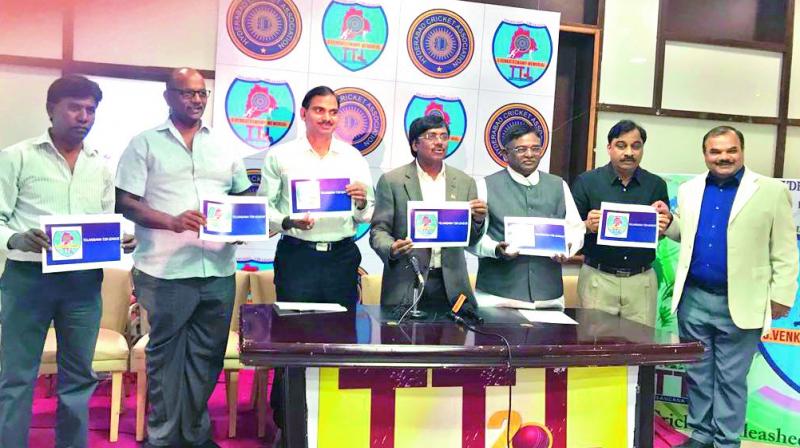 Officials hold up brochures of the Telangana T20 League (TTL) at a press conference addressed by Hyderabad Cricket Association office bearers at the Rajiv Gandhi International Cricket Stadium in Hyderabad on Tuesday.