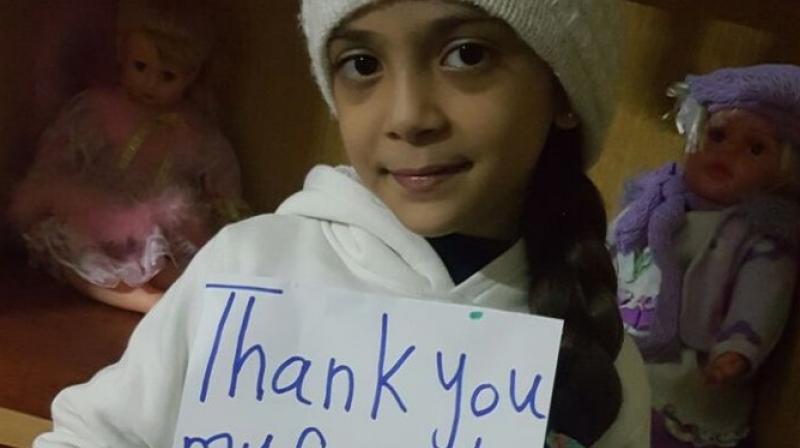 Little Bana thanks JK Rowling for her present. (Photo: Twitter/ @AlabedBana)