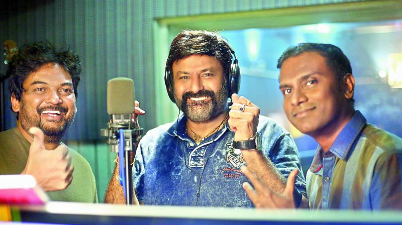 Puri Jagannadh, Balakrishna (middle) and Anup Rubens during the song recording.