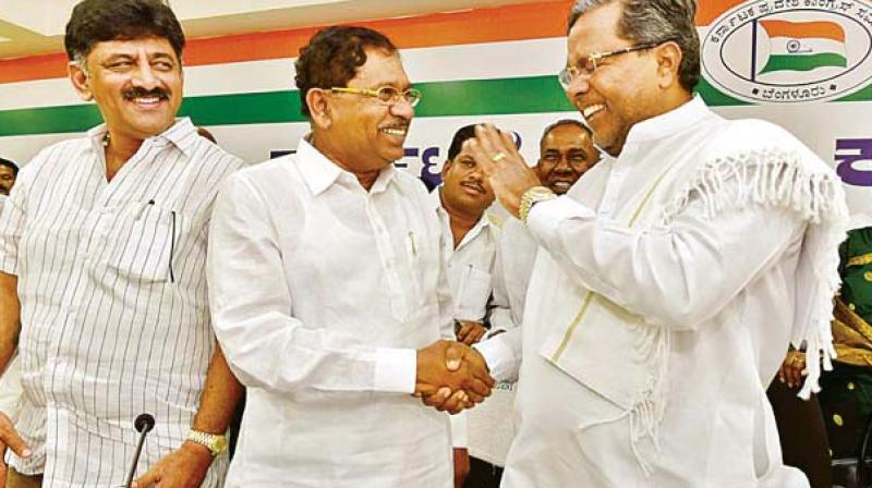 A file photo of Energy Minister D.K. Shivakumar, Home Minister Dr G. Parameshwar and CM Siddaramaiah