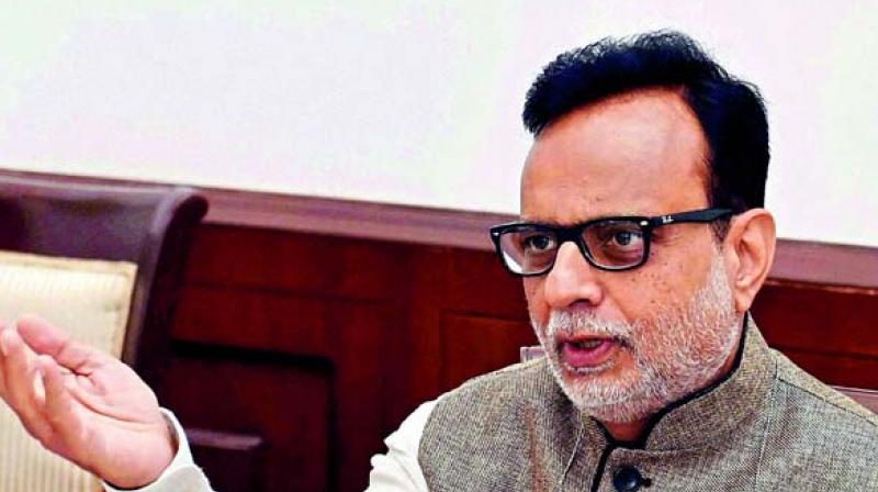 Revenue Secretary Hasmukh Adhia