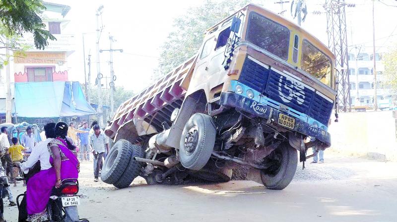 File image of a truck that was stuck in a road cave-in near the HUDA colony a few days ago. (Photo: DC)