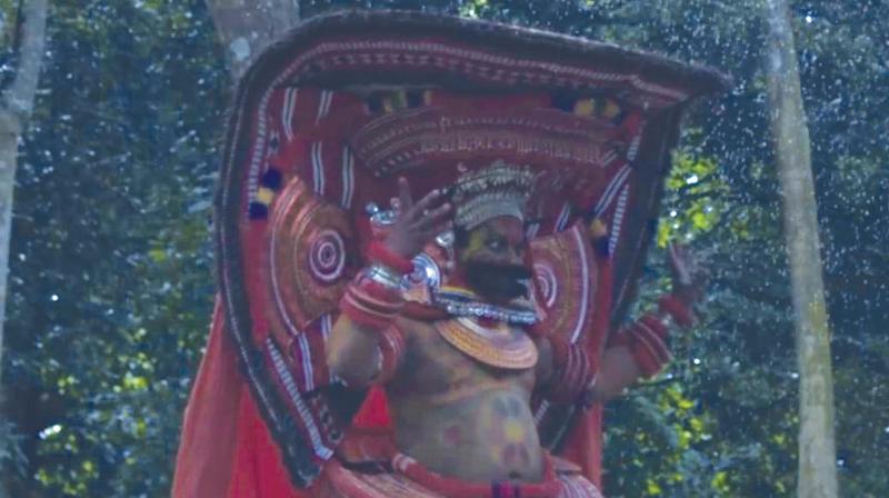 A still from the movie Theyyam