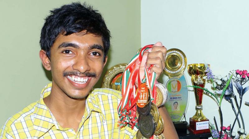 Shafil Maheen with his haul of medals