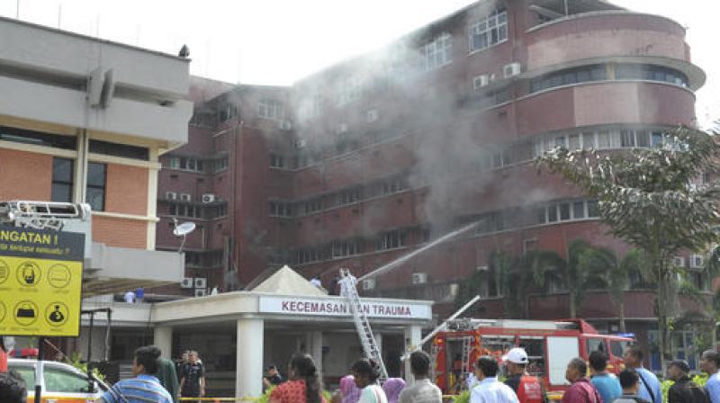 There were a total of 193 staff and 294 patients at the hospital when the fire broke out. A few others were injured in the blaze. (Photo: AP)