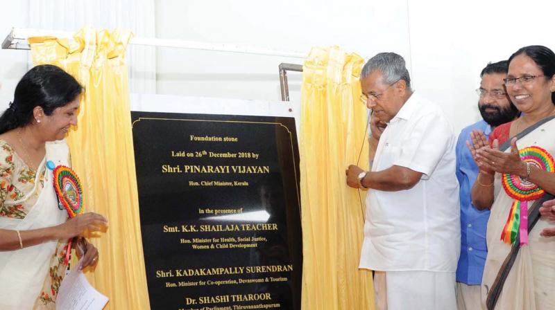 Chief Minister Pinarayi Vijayan unveils the foundation stone of the new multi-storey building at Regional Cancer Centre (RCC) coming up at Medical College Campus in Thiruvananthapuram on Wednesday. RCC director Rekha Nair, Health minister K.K. Shylaja and Tourism minister Kadakampally Surendran look on. (DC)