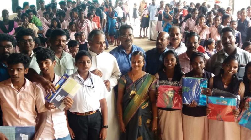 Students of St Joseph Higher Secondary School, Thiruvananthaparum, gift new clothes as Christmas gifts for students of Government Higher Secondary School in Kidangara, Kuttanad.