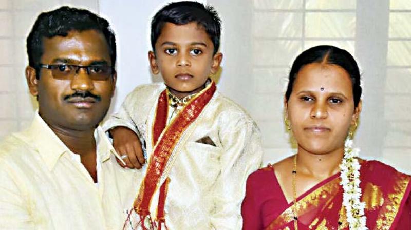 6-year-old Indrajit with his parents.
