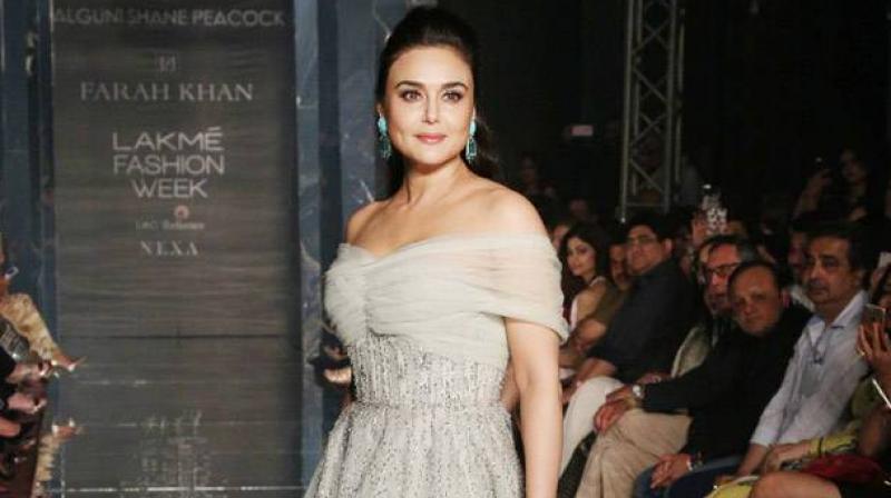 Preity Zinta was recently spotted wearing a shawl and walking out of a restaurant and a dubbing studio recently.