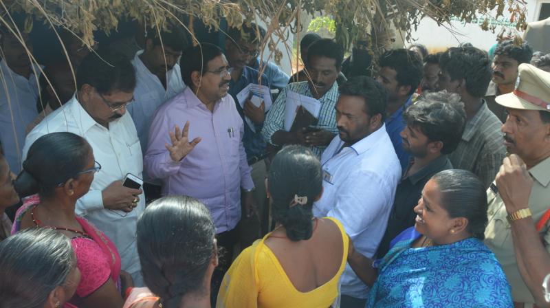 Municipal administration minister P. Narayana seen interact with people in Kottur village in Nellore city on Wednesday. (Photo: DC)