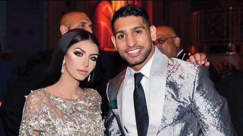 British professional boxer Amir Khan has been hit by more claims of exchanging sexual messages with two women