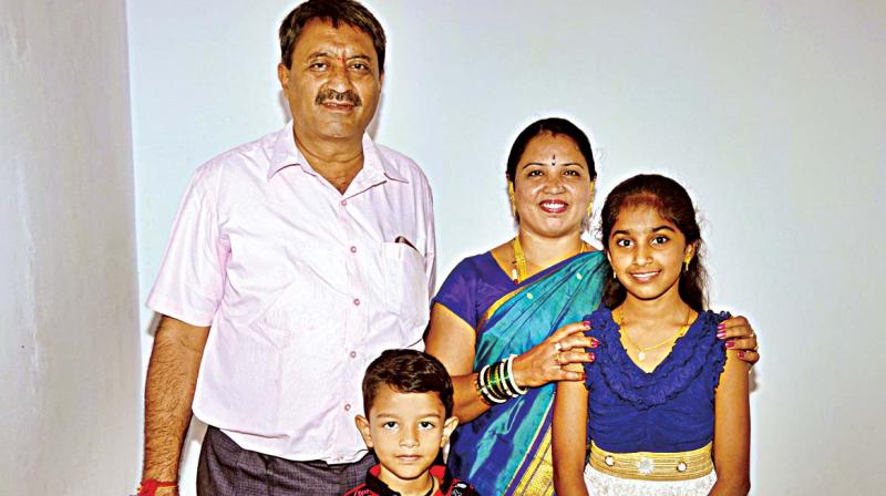 Siya Khode with her brother and parents