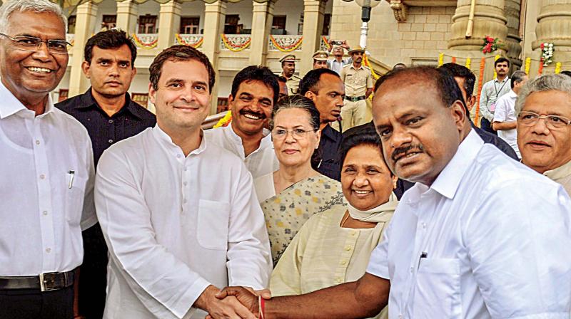 Shape of things to be come? Congress leaders with BSP leader Mayawati and Chief Minister Kumaraswamy at his swearing-in on Wednesday  (Image: DC)