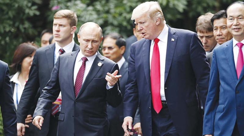 US President Donald Trump with his Russian counterpart Vladimir Putin at the APEC summit in Vietnam	(Image: AP)